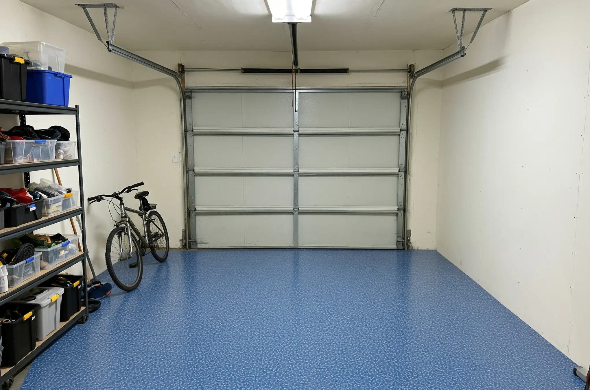 A garage floor finished in ANVIL Cobalt
