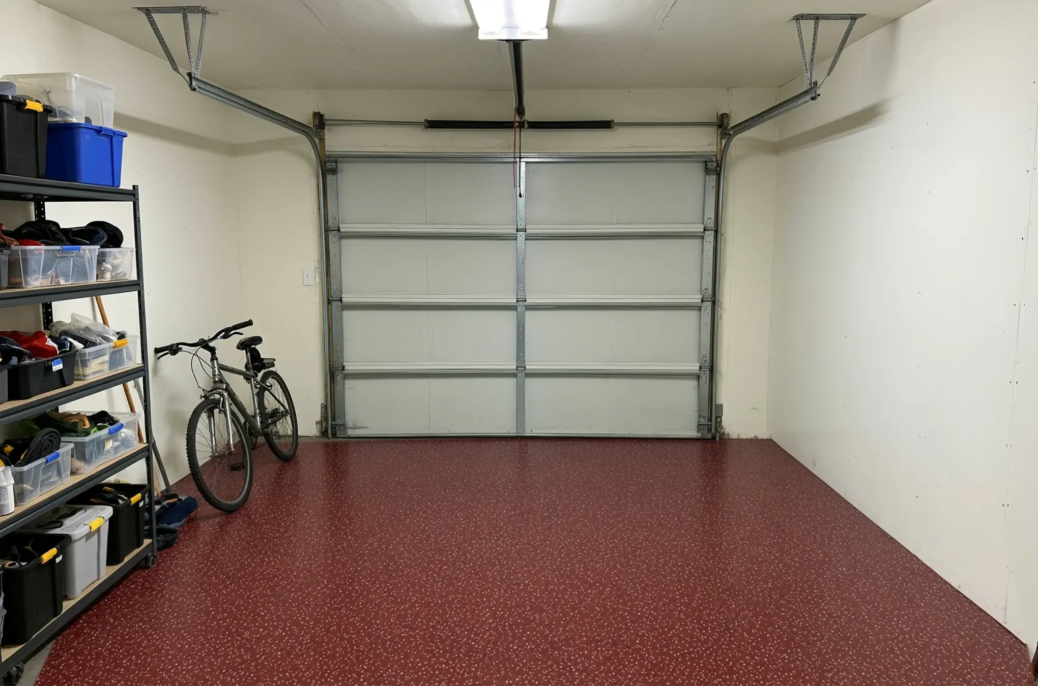 A garage floor finished in ANVIL Firebrick