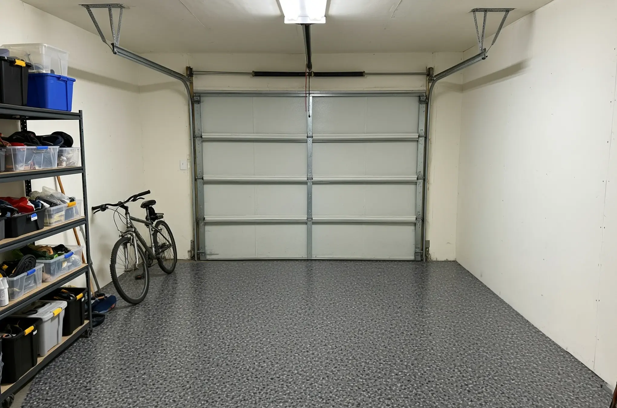 A garage floor finished in ANVIL Graphite